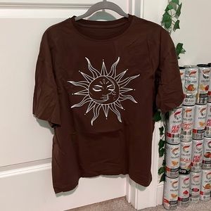 oversized brown sun and moon short sleeved t-shirt
